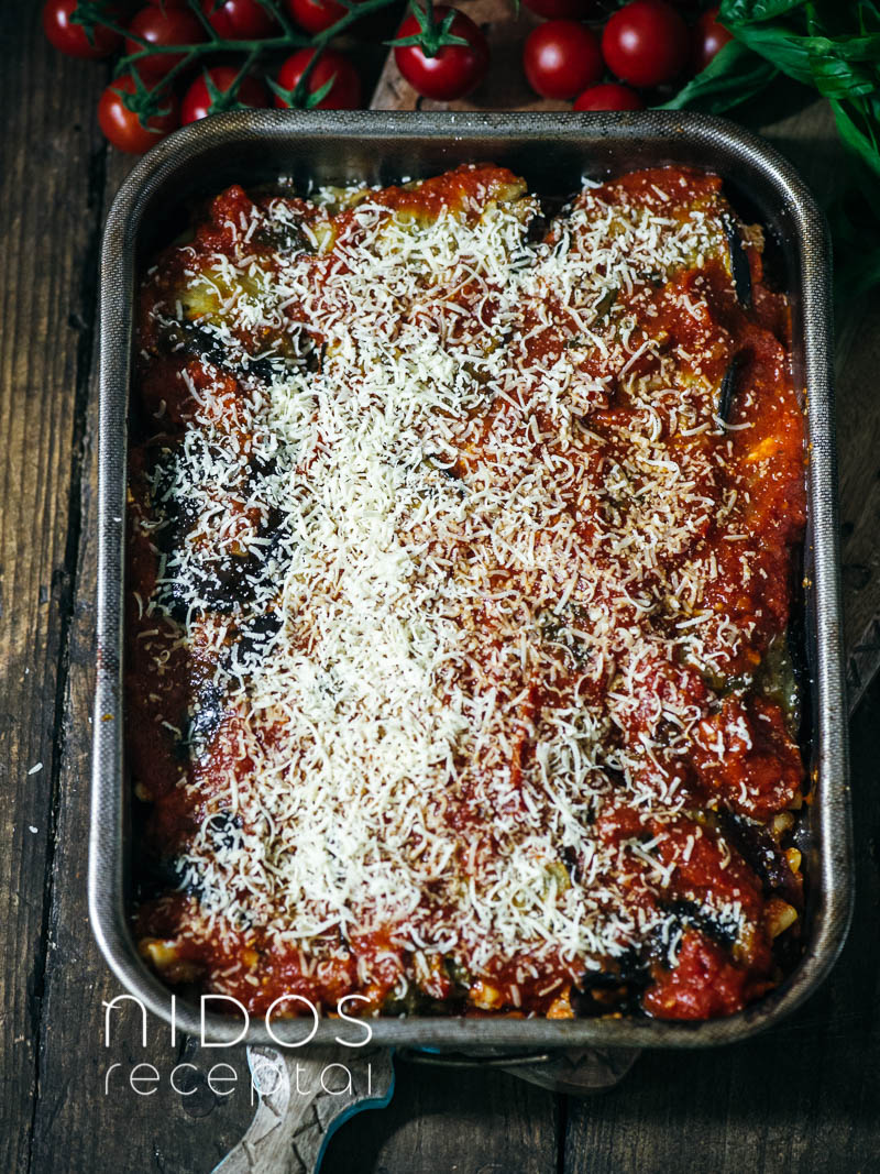 Eggplant involtini in a tray bake sprinkled with cheese