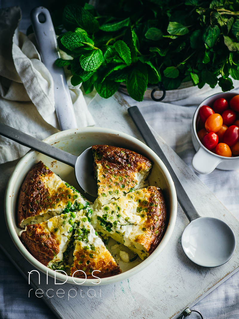 quiche with peas and feta in a pan