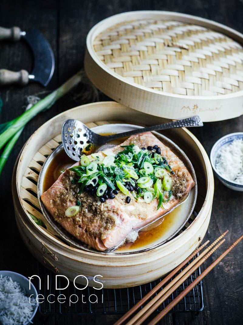 Cantonese steamed salmon in a bamboo steamer